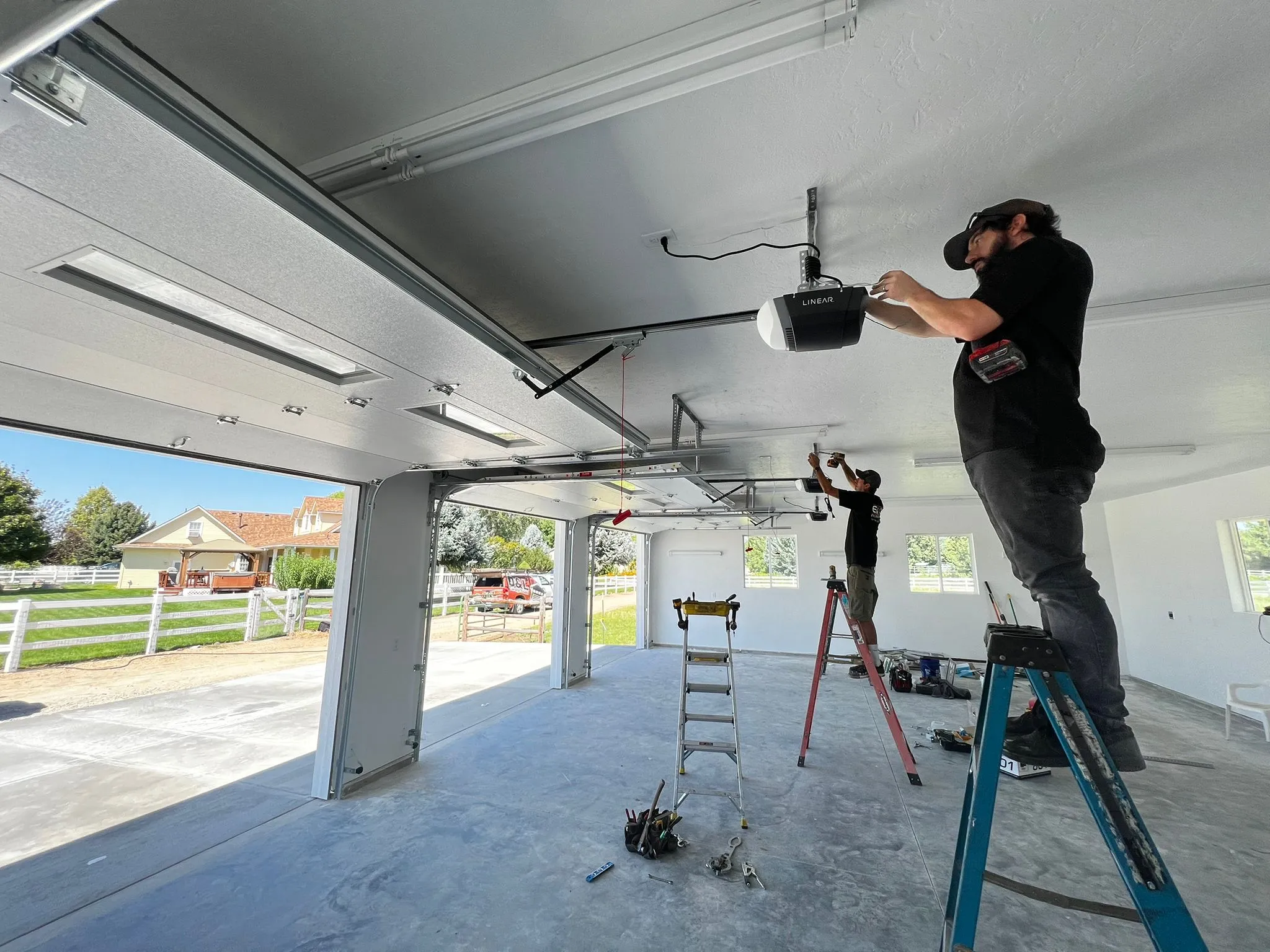 Professional installation of smart garage door opener system