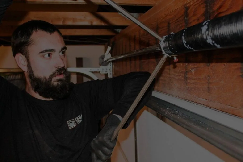 Professional spring installation by D&L Garage Doors technician